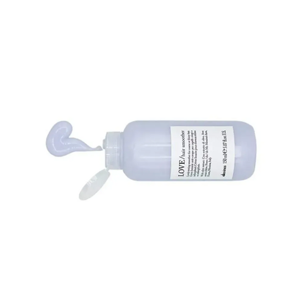 DAVINES LOVE Незмивний крем для розгладження неслухняного та хвилястого волосся з ефектом антифриз Essential Haircare Hair Smoother, 150 мл 110222 фото